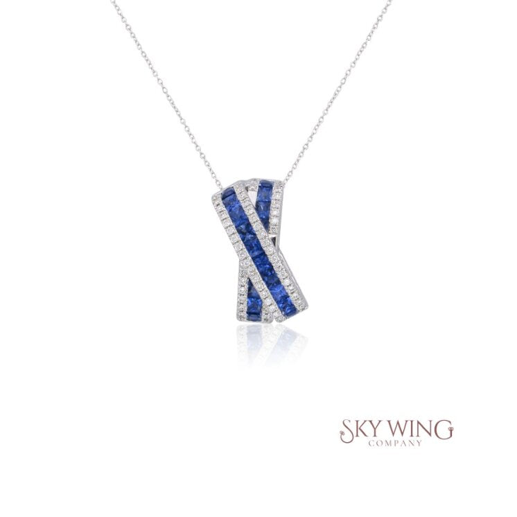 PRINCESS CUT EMERALD & ROUND DIAMOND CRISS CROSS PENDANT