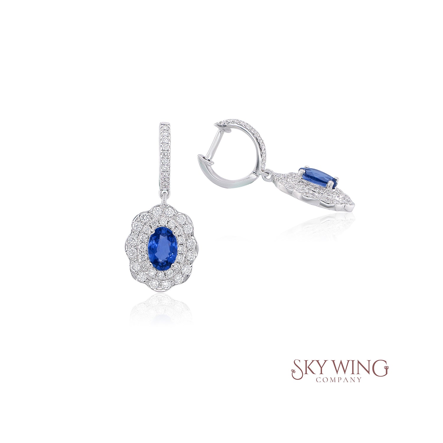 diamond earrings oval blue sapphire dangle