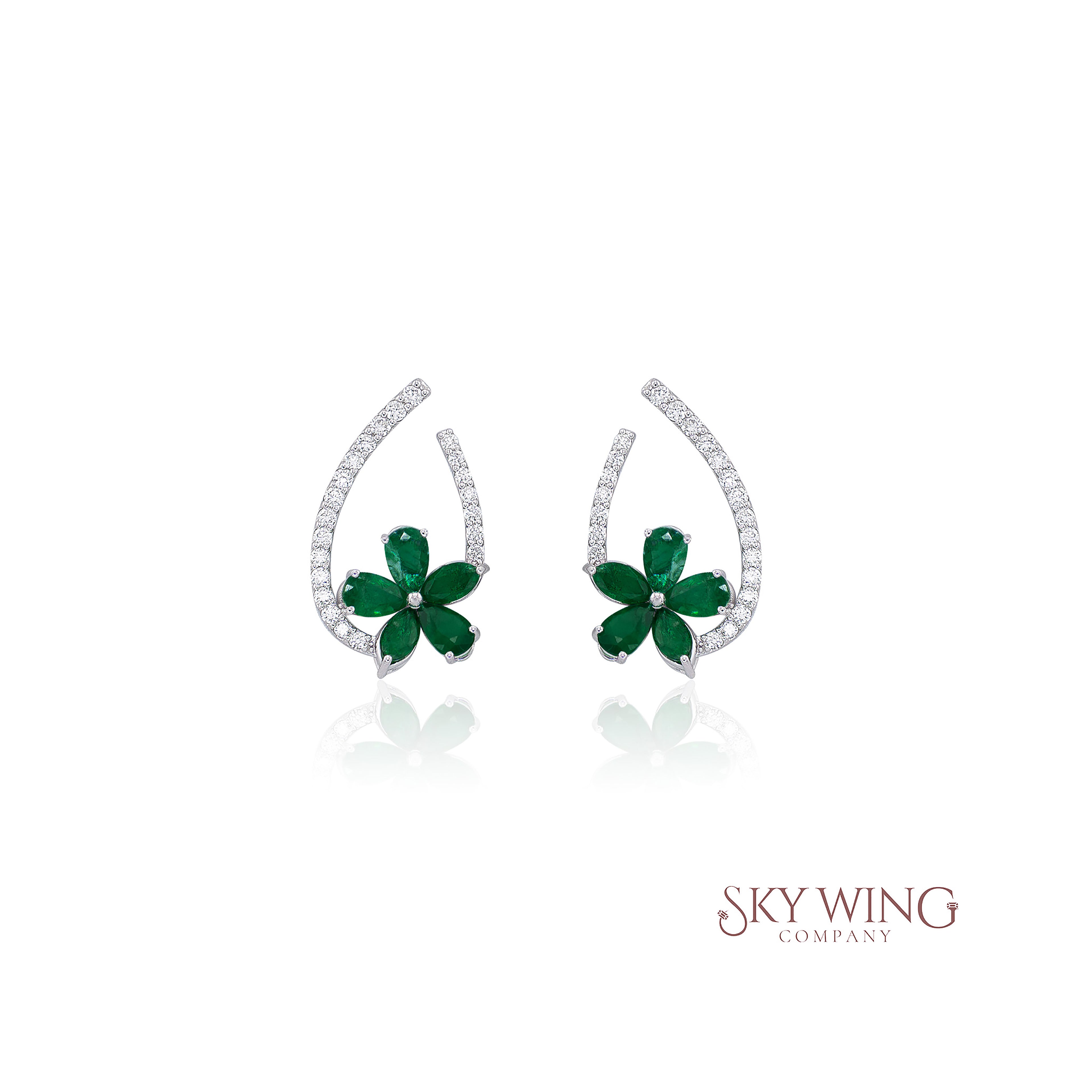 flower emerald and round diamond earring