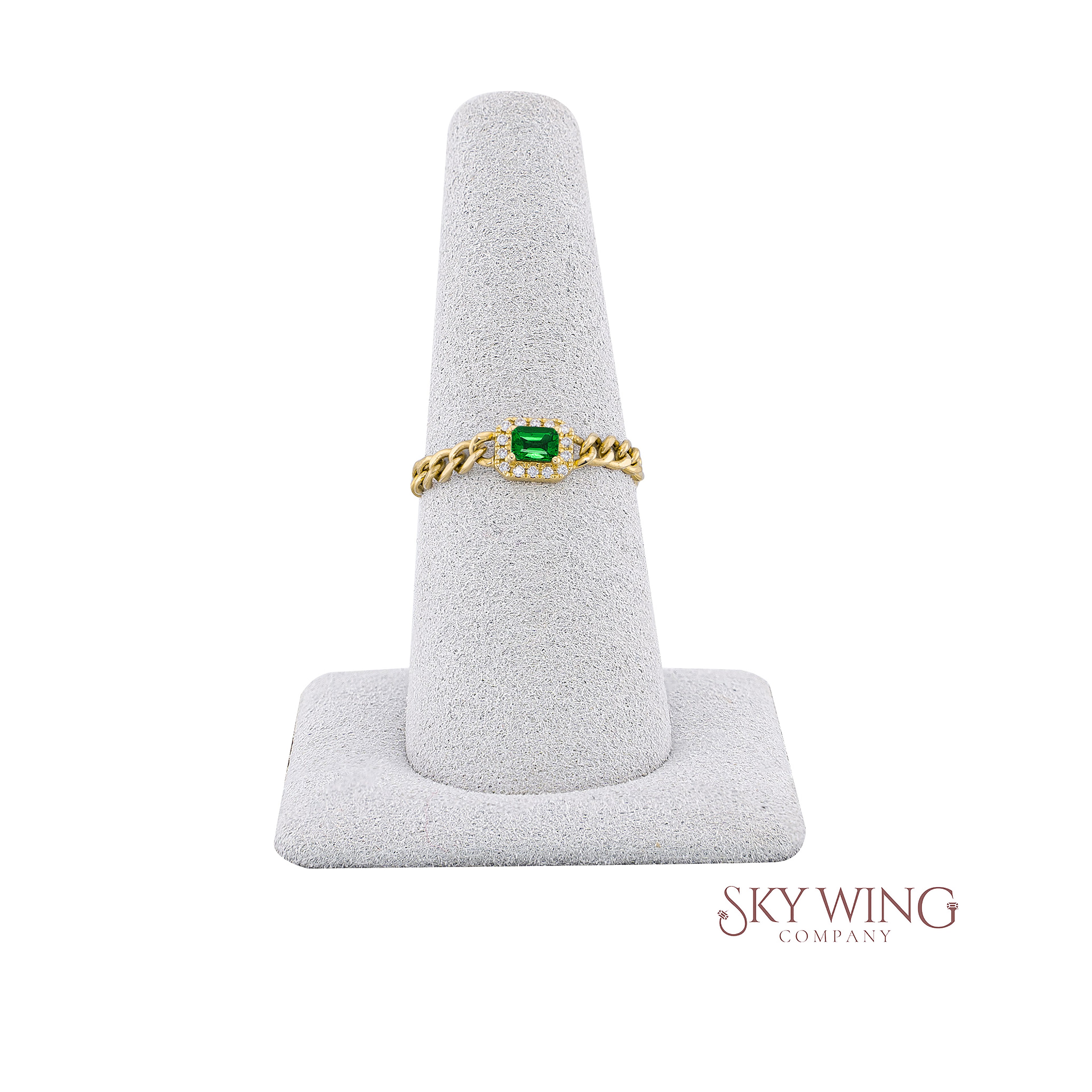 CHAIN EMERALD OCTAGON AND ROUND DIAMOND RING