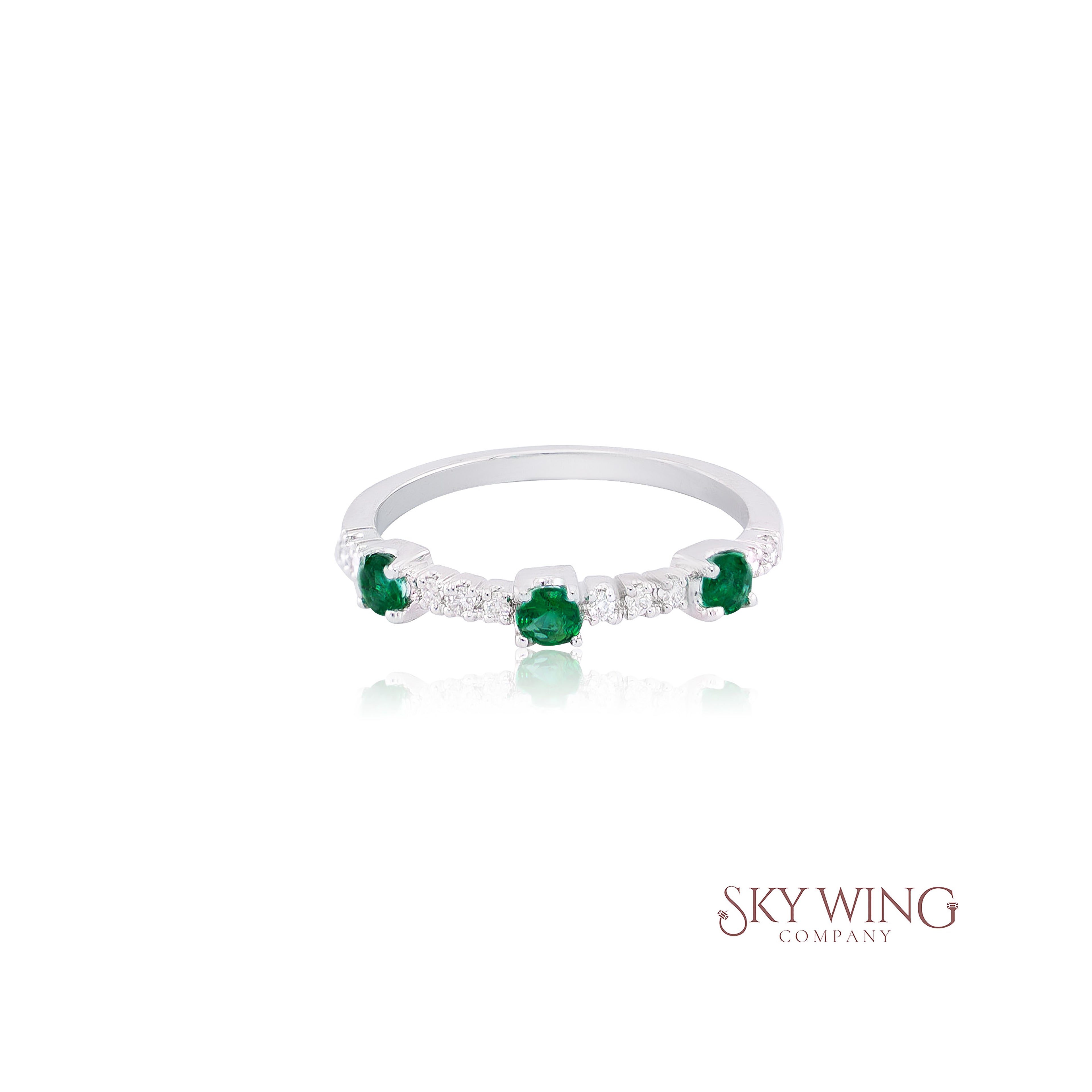 DIA: & 3 ROUND EMERALD STATION RING