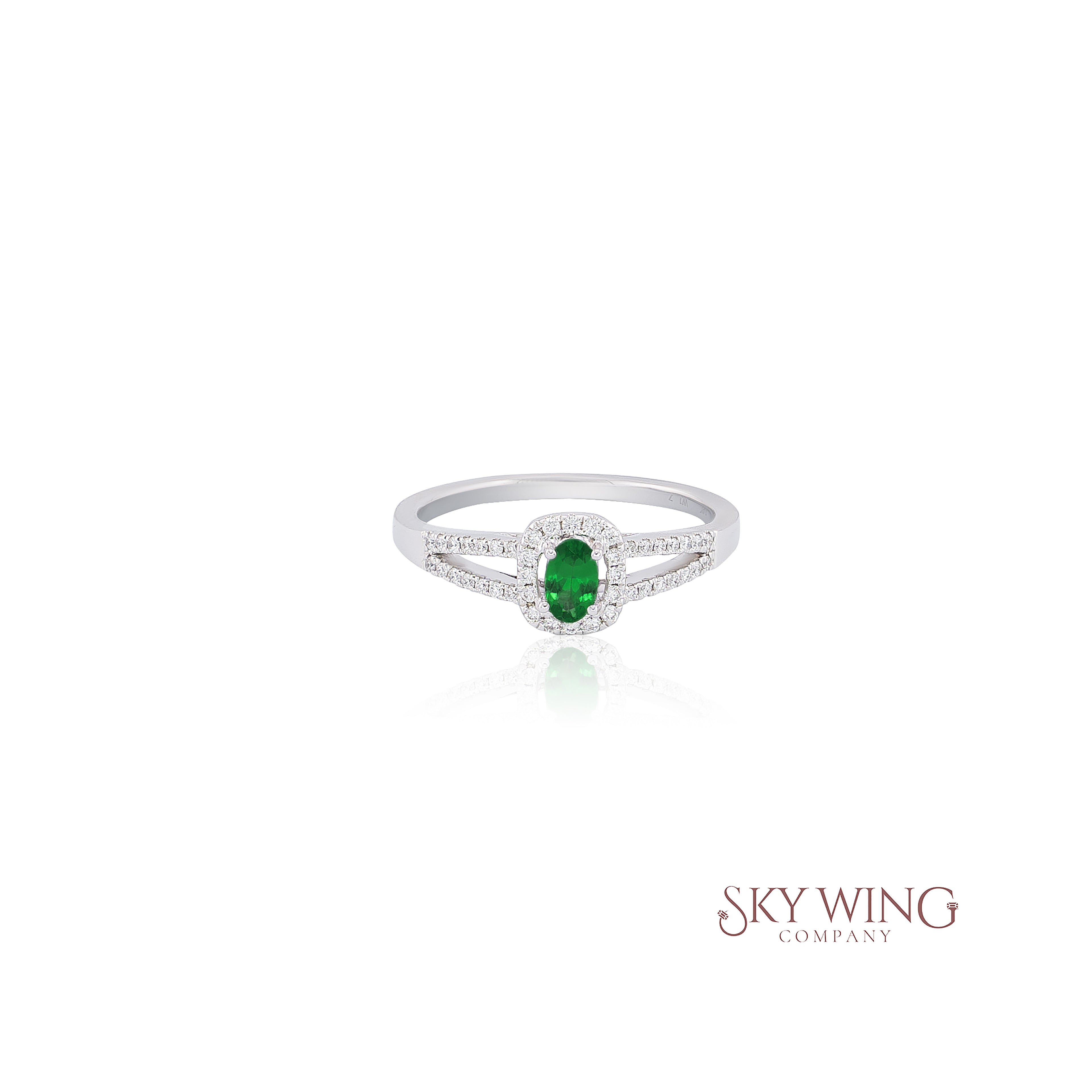 OVAL TSAVORITE AND ROUND DIAMOND STATEMENT RING