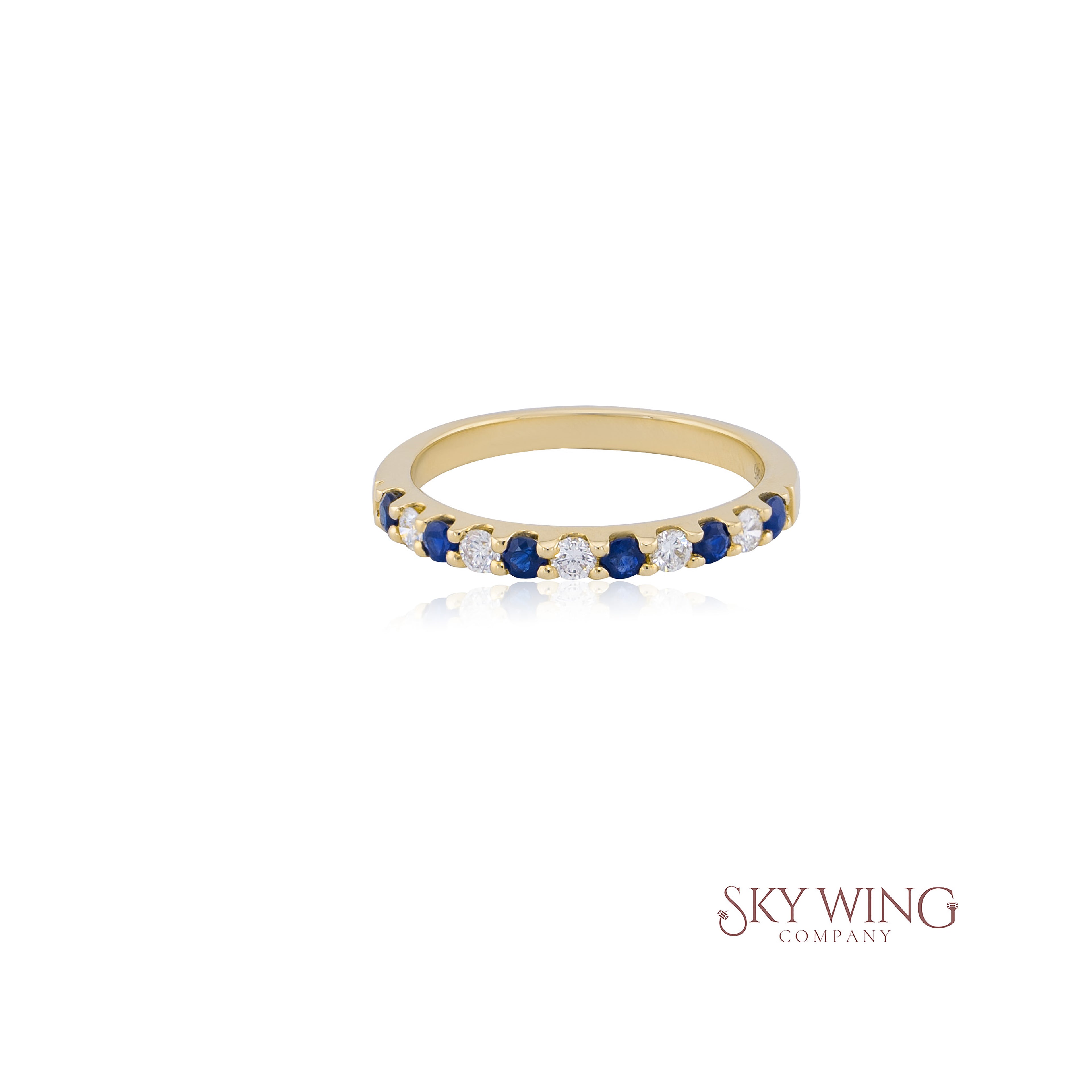 DIA: & SAPPHIRE PRONG SET BAND