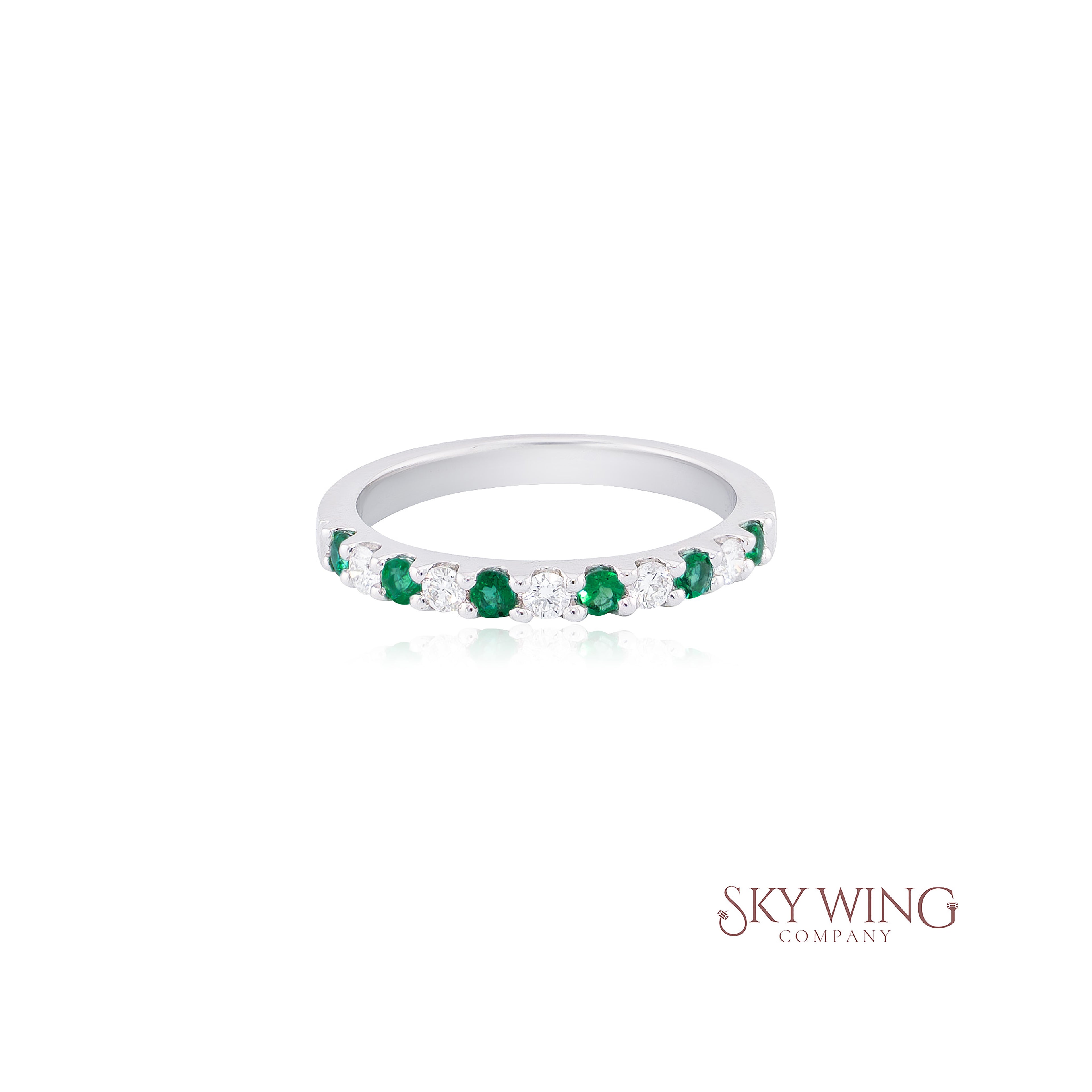 DIA: & EMERALD PRONG SET BAND
