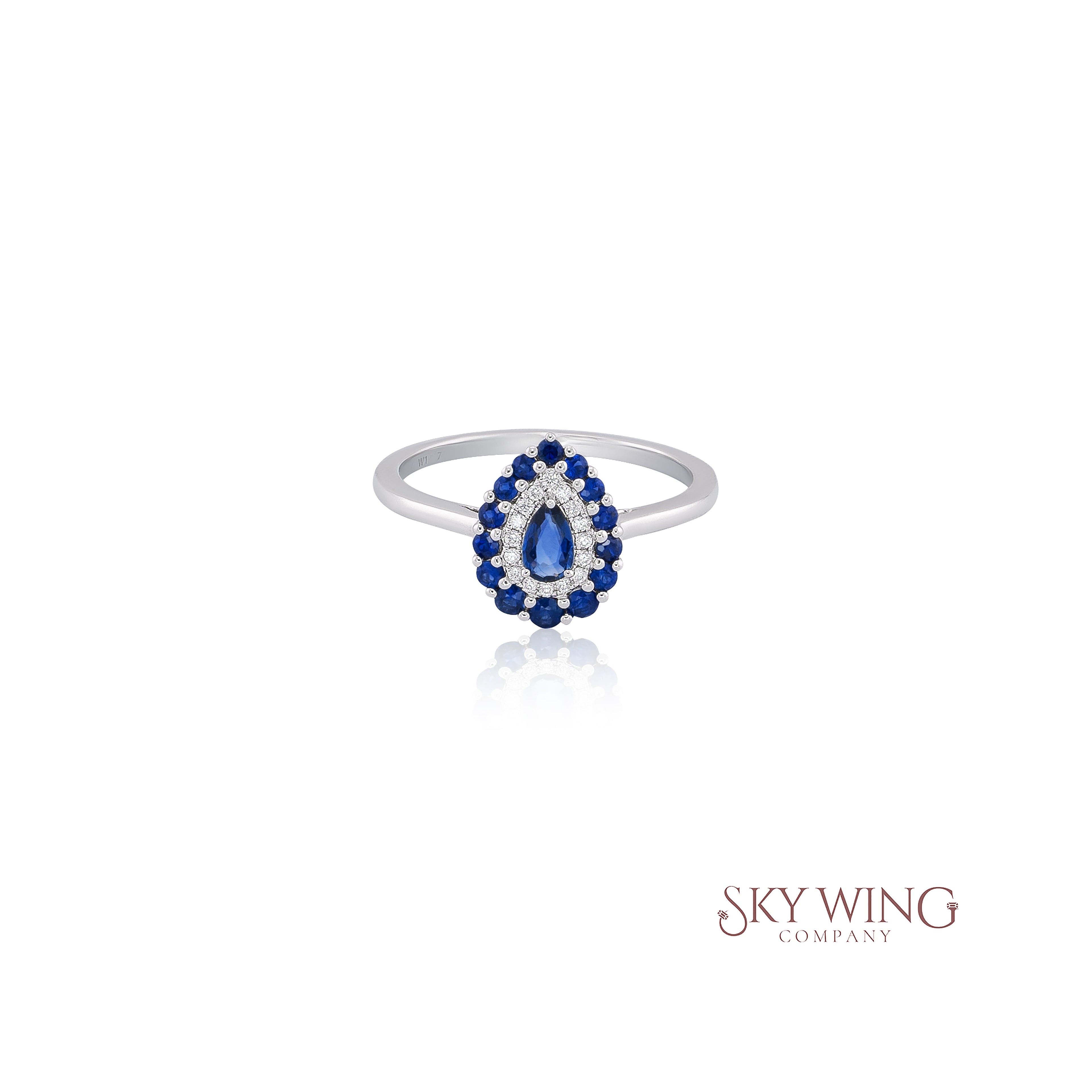 PEAR SHAPED ROUND BLUE SAPPHIRE AND DIAMOND RING