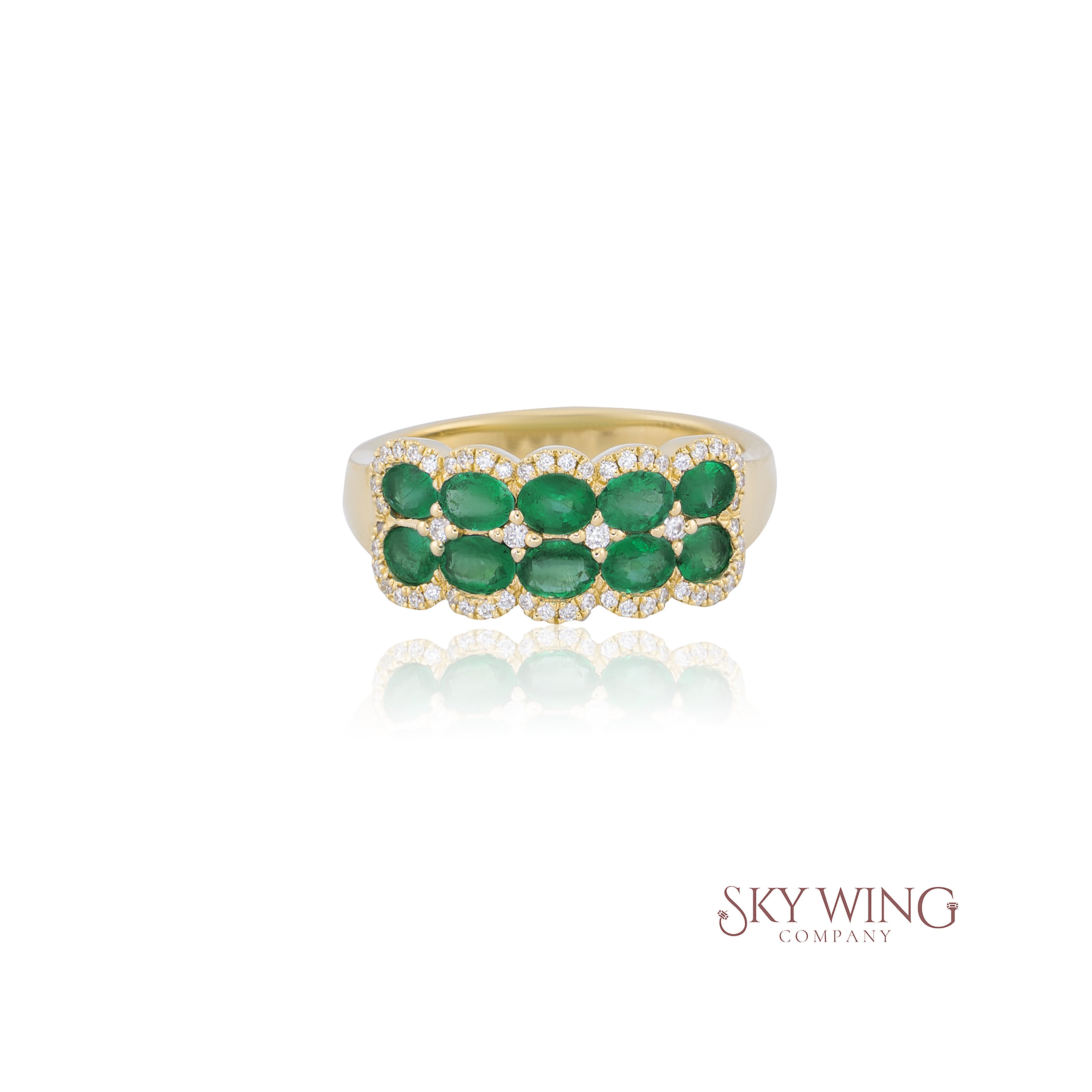 OVAL CUT EMERALD & DIAMOND RING