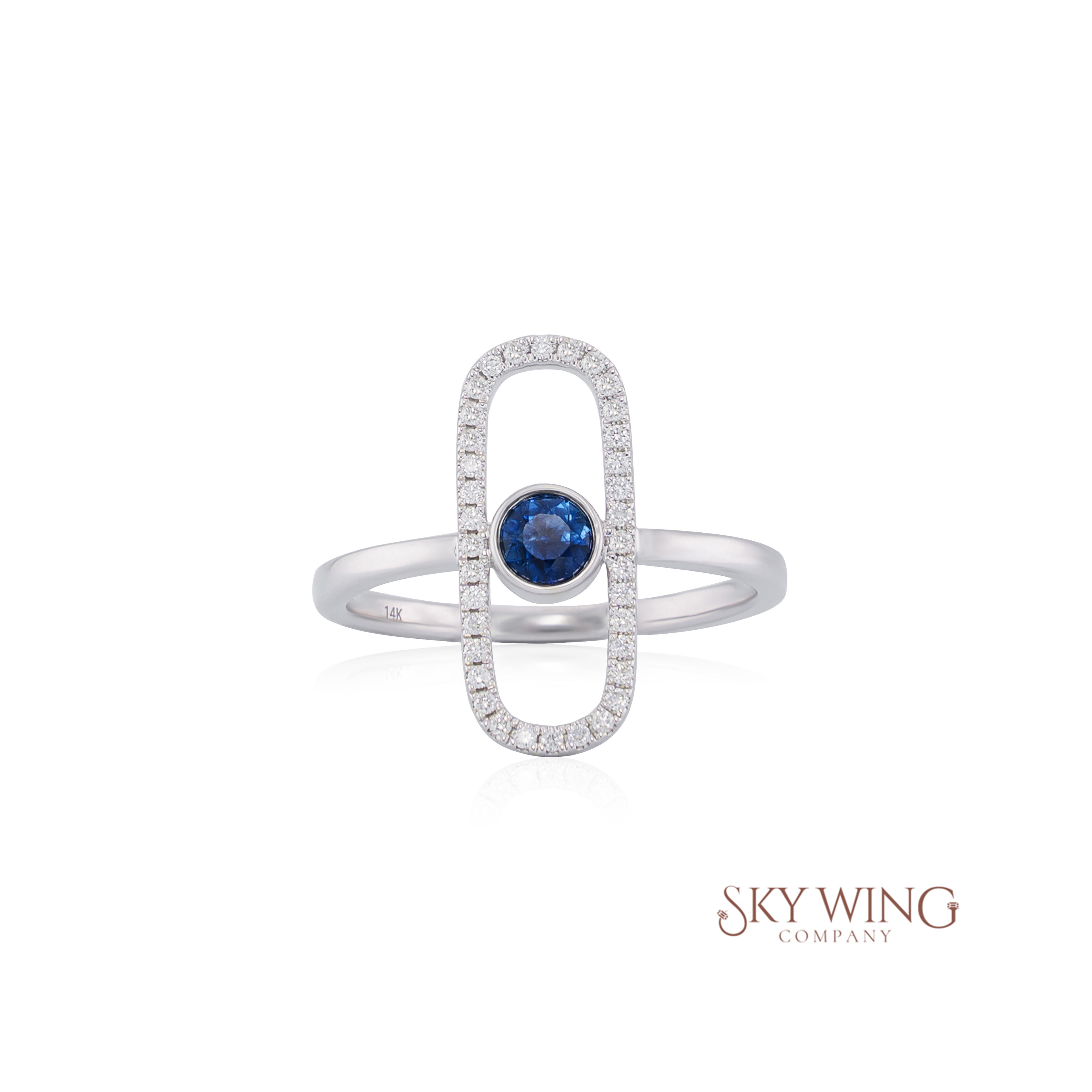 DIAMOND CUT BLUE SAPPHIRE AND ROUND DIAMOND STATEMENT RING