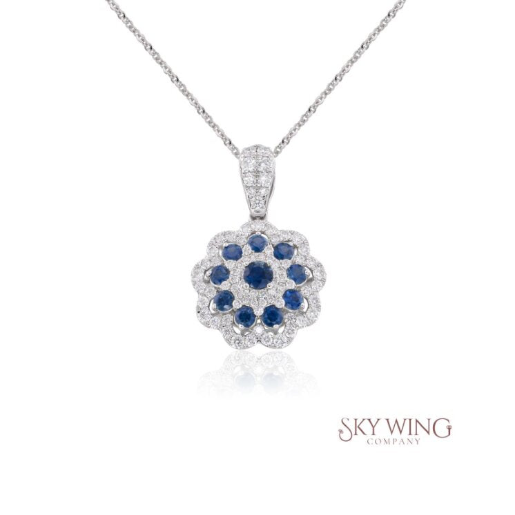 BLUE SAPPHIRE AND DIAMOND FLOWER PENDANT