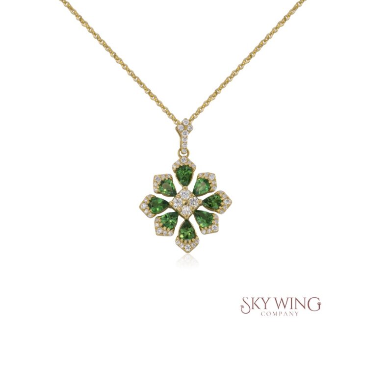 ROUND DIAMOND AND TSAVORITE SNOWFLAKE PENDANT