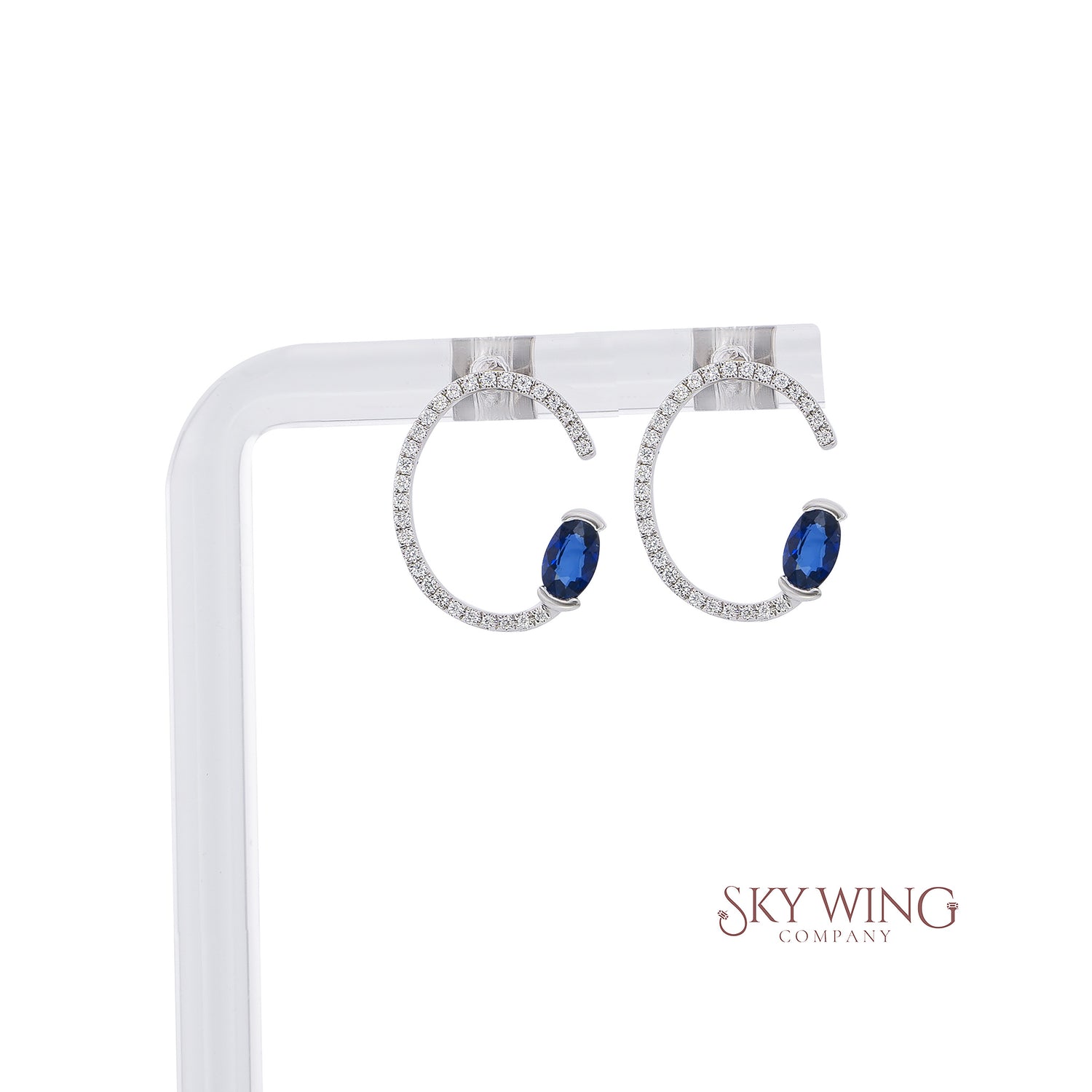 BLUE SAPPHIRE OVAL AND ROUND DIAMOND EARRING