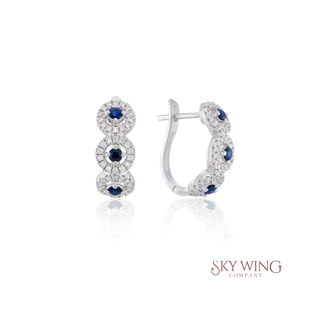 DIAMOND AND BLUE SAPPHIRE TWISTED HUGGIES HOOP EARRING