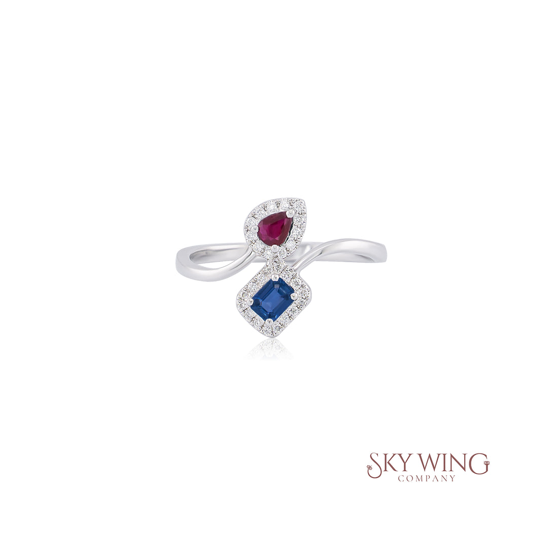 DIA: &amp; PEAR SHAPE RUBY AND OCTAGON SHAPE SAP: BYPASS RING