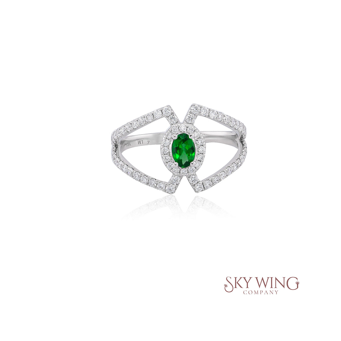 OVAL TSAVORITE AND ROUND DIAMOND RING