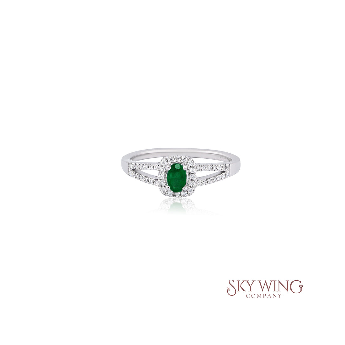 OVAL EMERALD &amp; ROUND DIAMOND RING