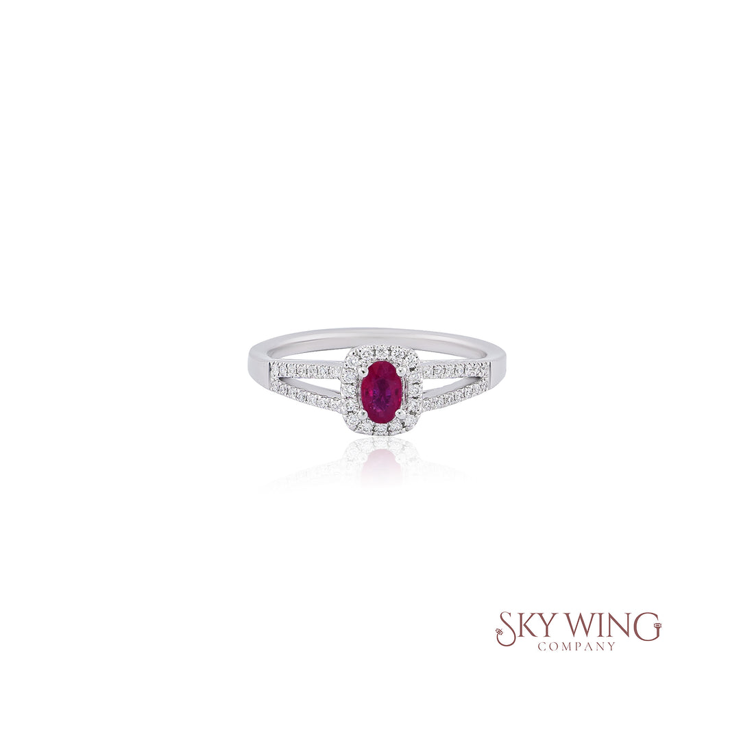 OVAL RUBY &amp; ROUND DIAMOND RING