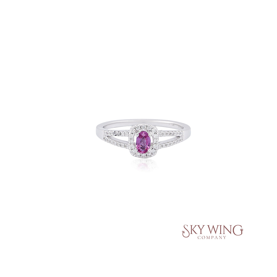 OVAL PINK SAPPHIRE AND ROUND DIAMOND STATEMENT RING