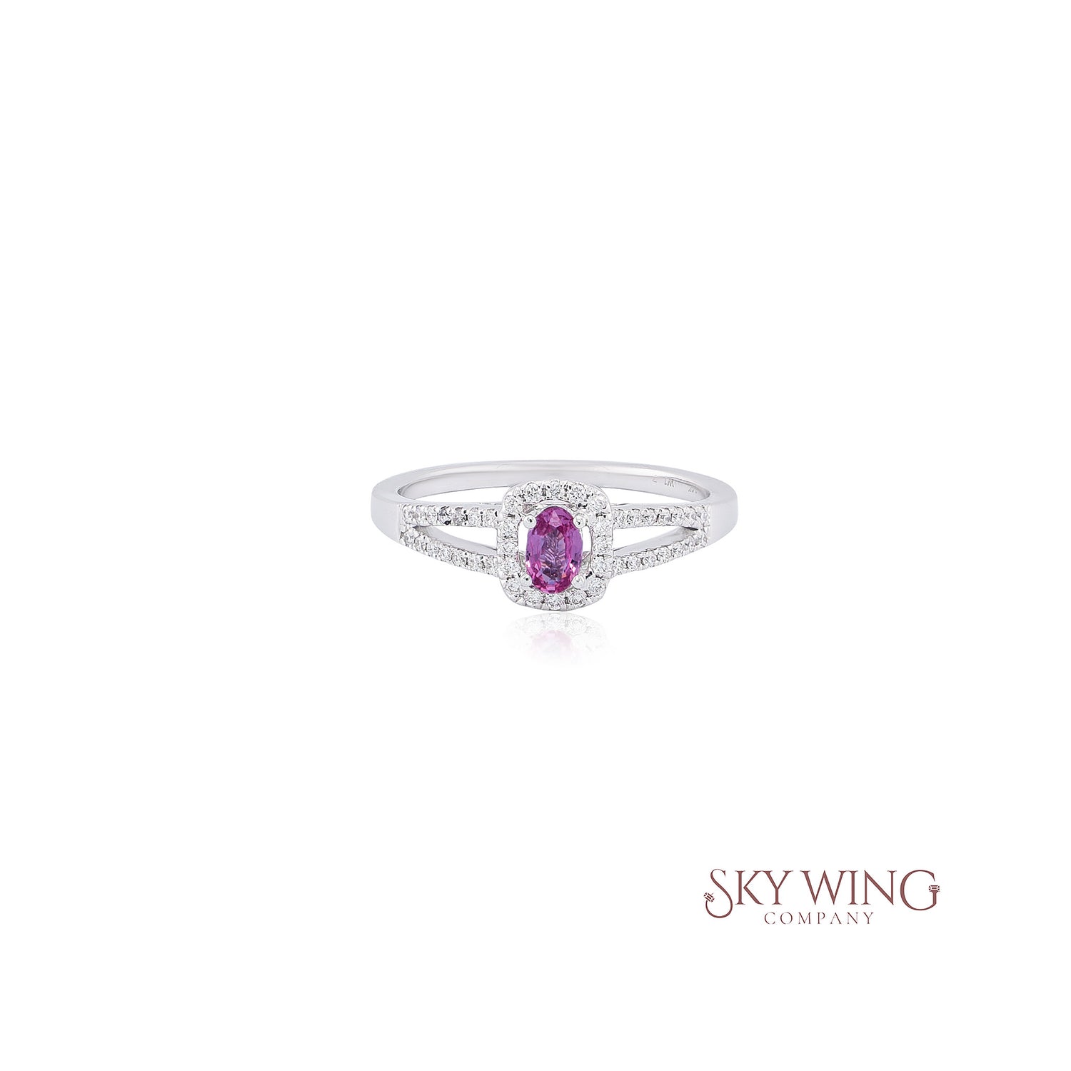 OVAL PINK SAPPHIRE AND ROUND DIAMOND STATEMENT RING