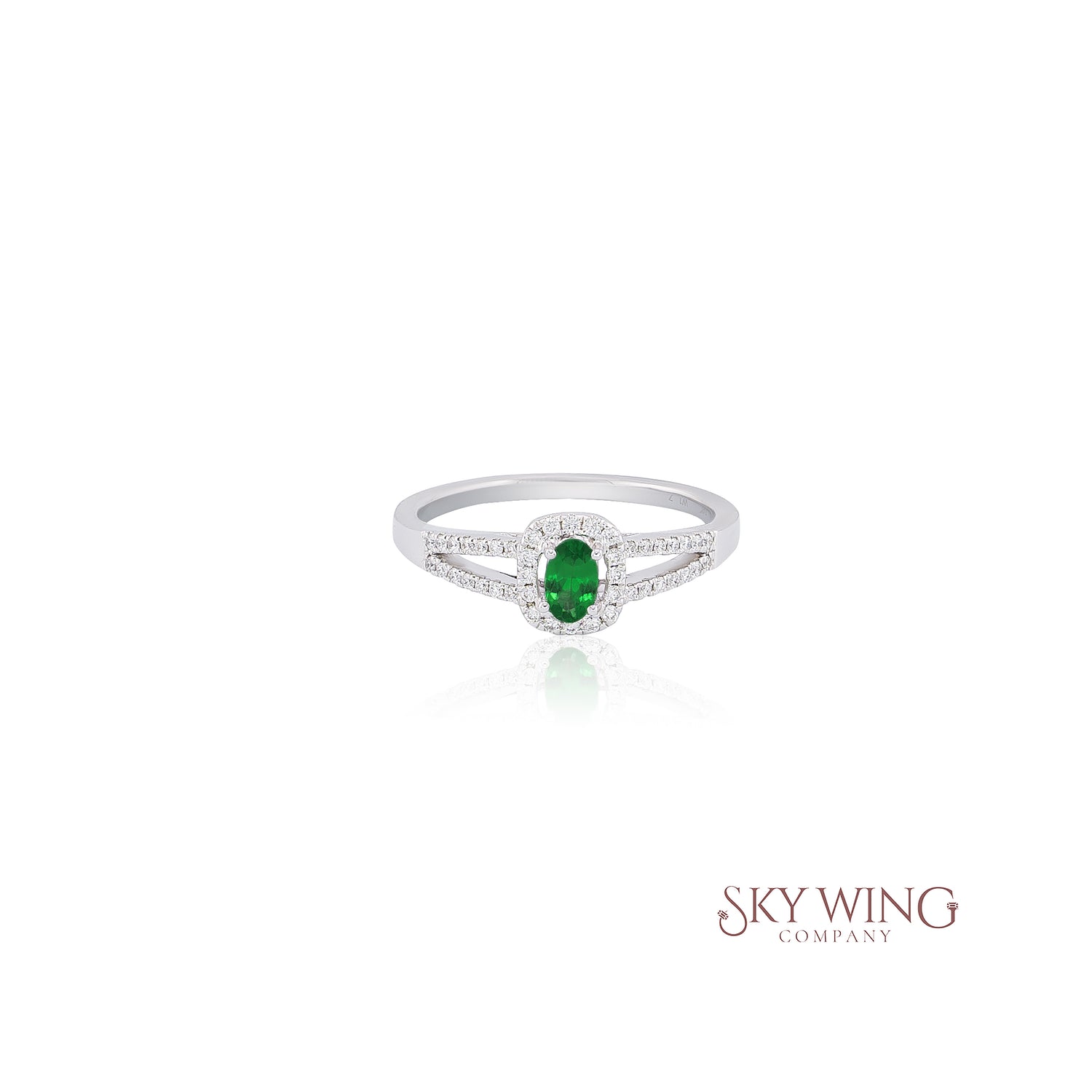 OVAL TSAVORITE AND ROUND DIAMOND STATEMENT RING
