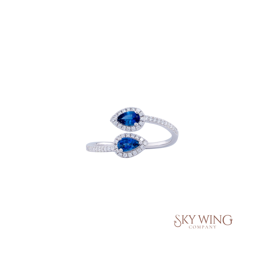 PEAR SHAPED BLUE SAPPHIRE AND ROUND DIAMOND RING