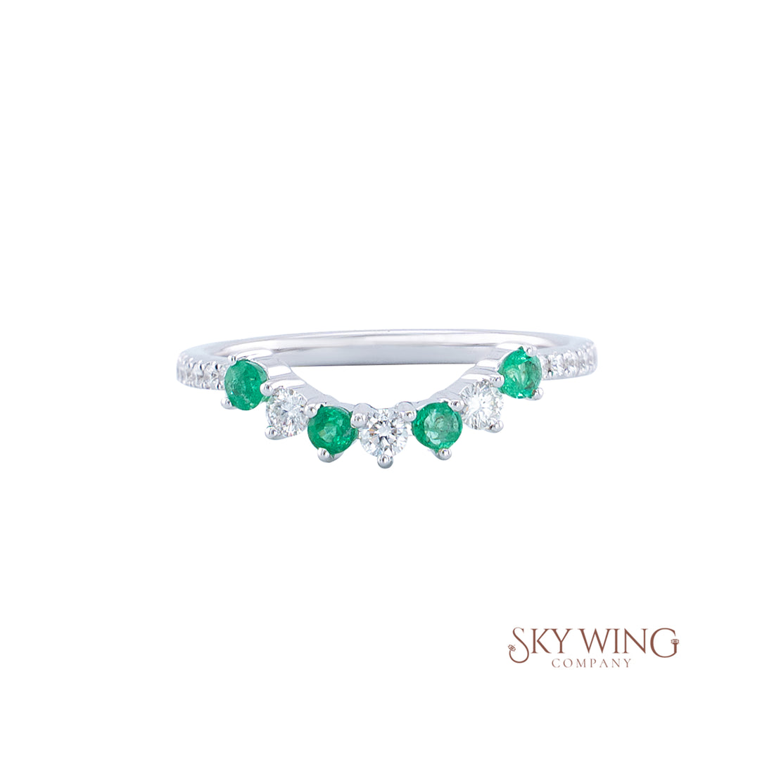 OVAL EMERALD AND ROUND DIAMOND RING
