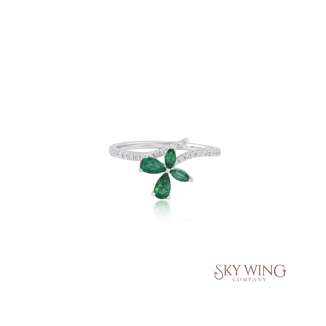 PEAR SHAPED EMERALD AND ROUND DIAMOND BUTTERFLY RING