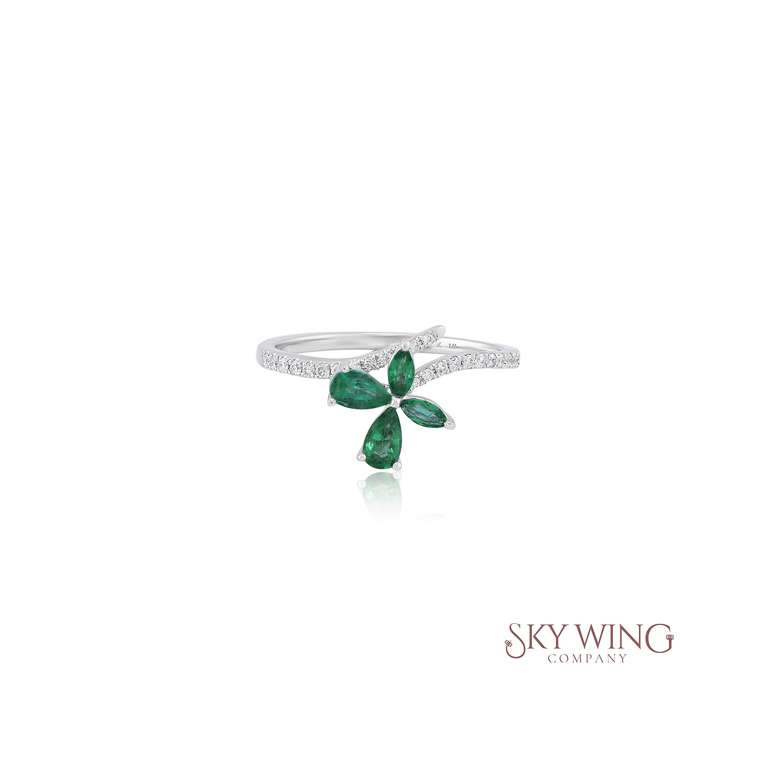 PEAR SHAPED EMERALD AND ROUND DIAMOND BUTTERFLY RING