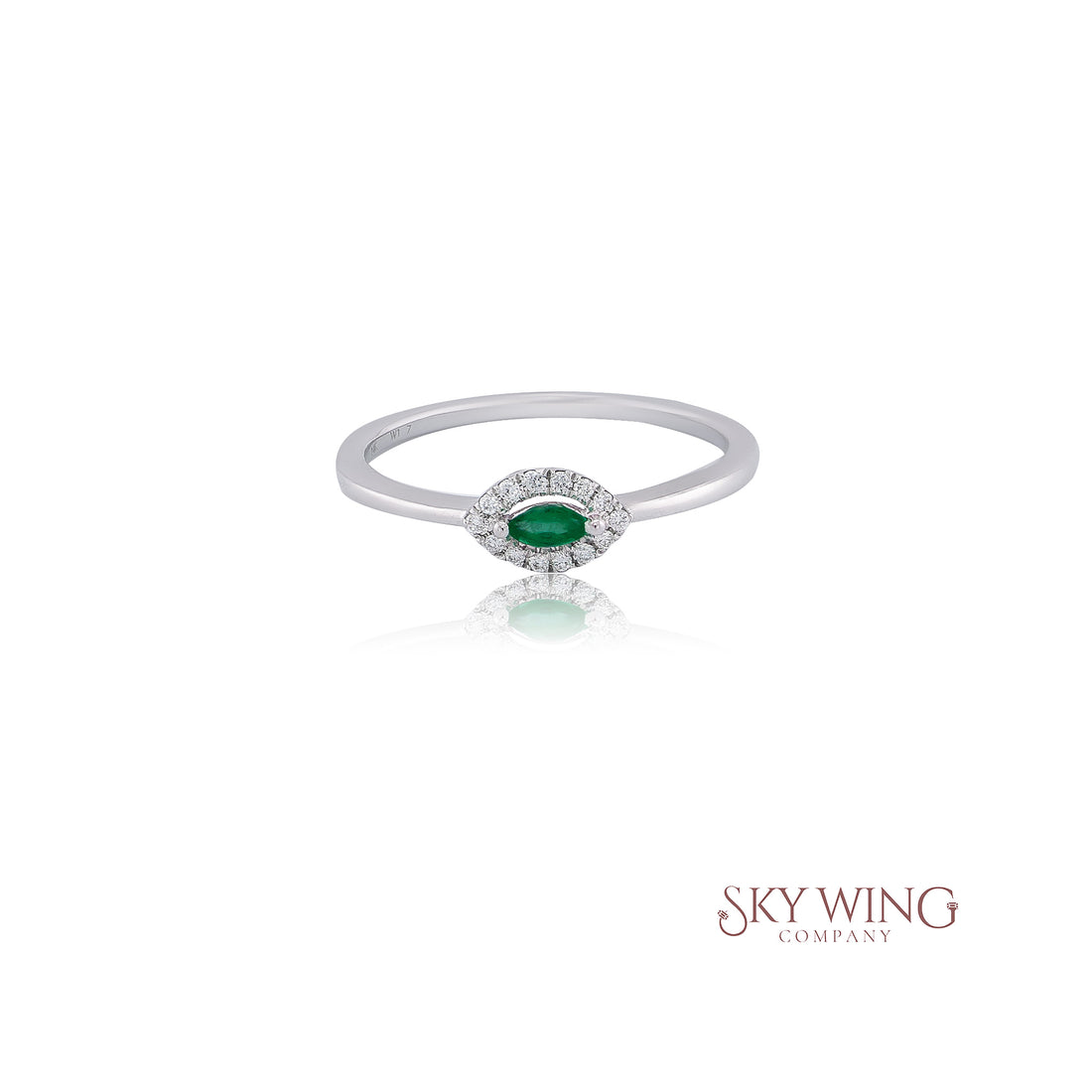 EMERALD MARQUISE AND ROUND DIAMOND RING