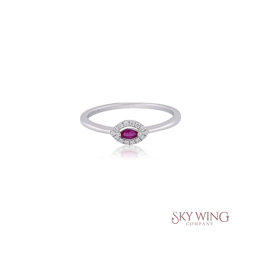 RUBY MARQUISE AND ROUND DIAMOND RING