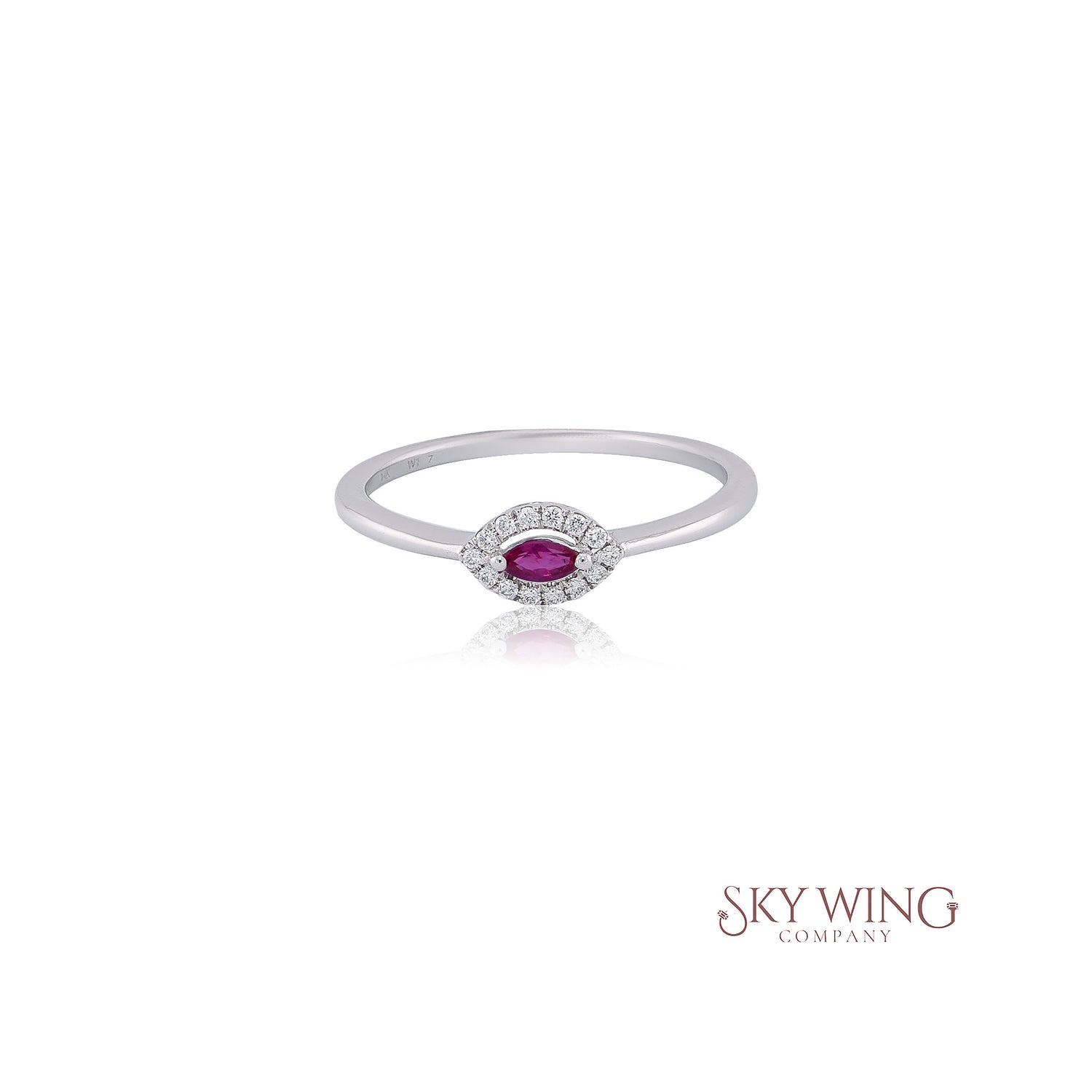 RUBY MARQUISE AND ROUND DIAMOND RING