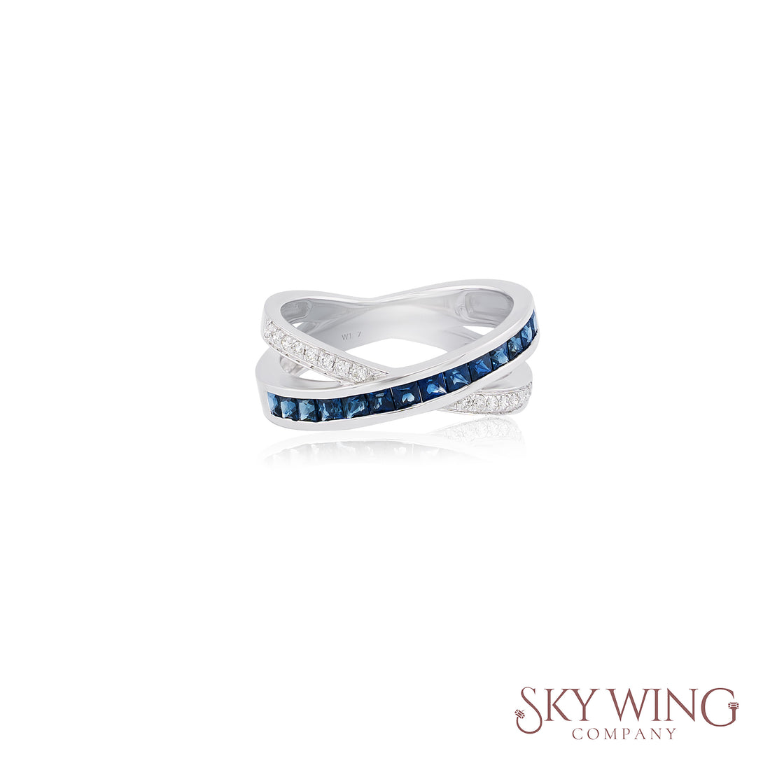 DIAMOND AND BLUE SAPPHIRE CROSSOVER RING