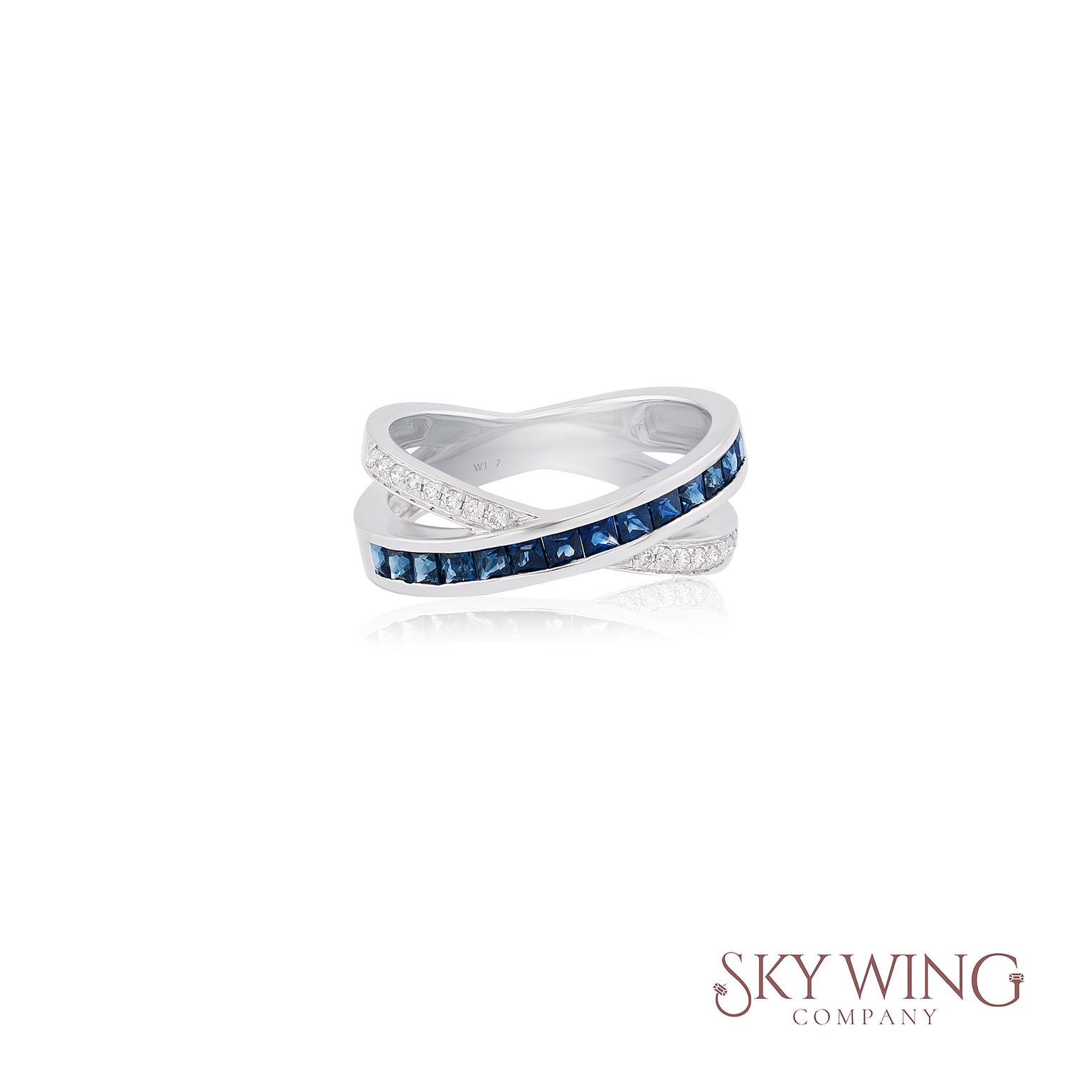 DIAMOND AND BLUE SAPPHIRE CROSSOVER RING