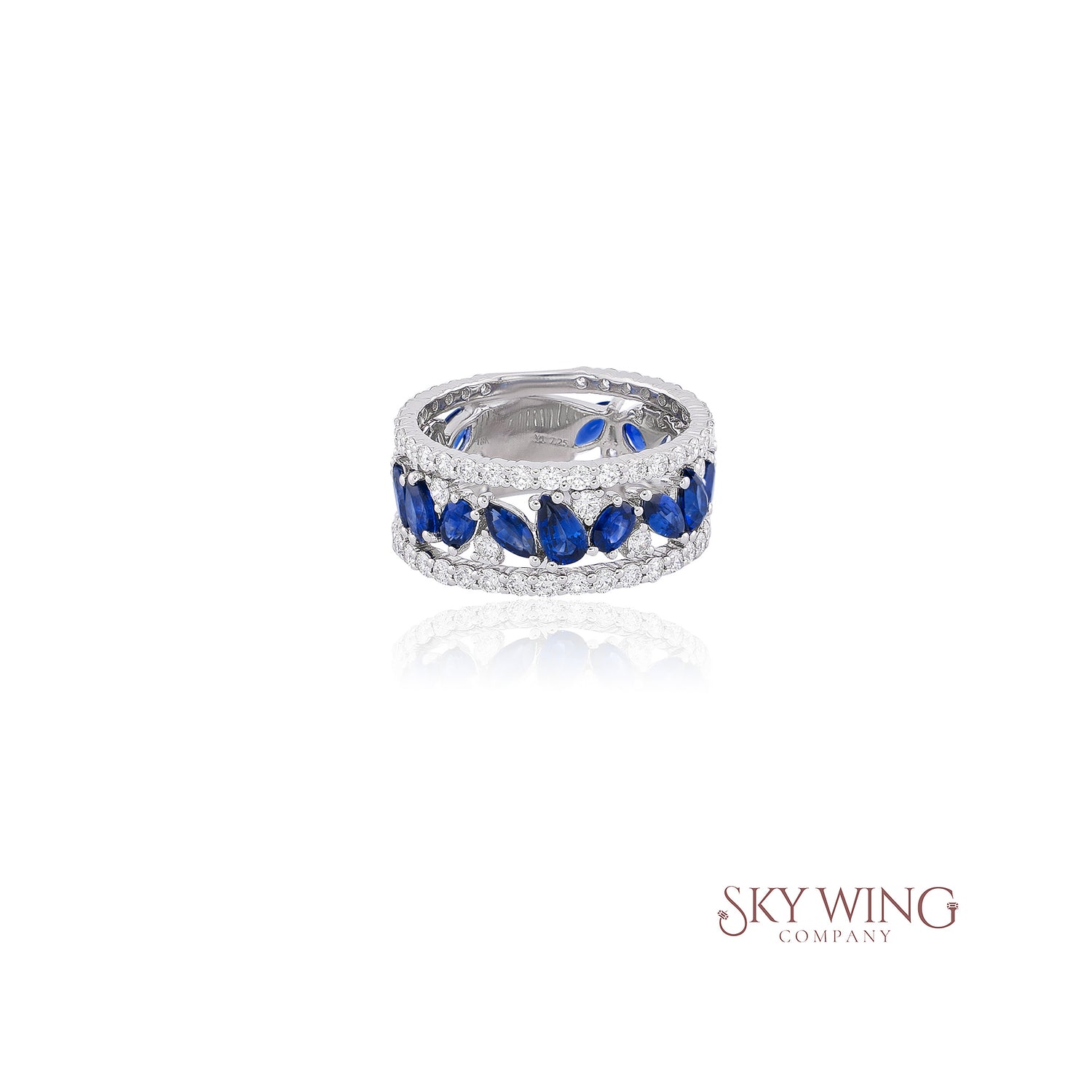 DIAMOND AND PEAR SHAPED BLUE SAPPHIRE BAND RING