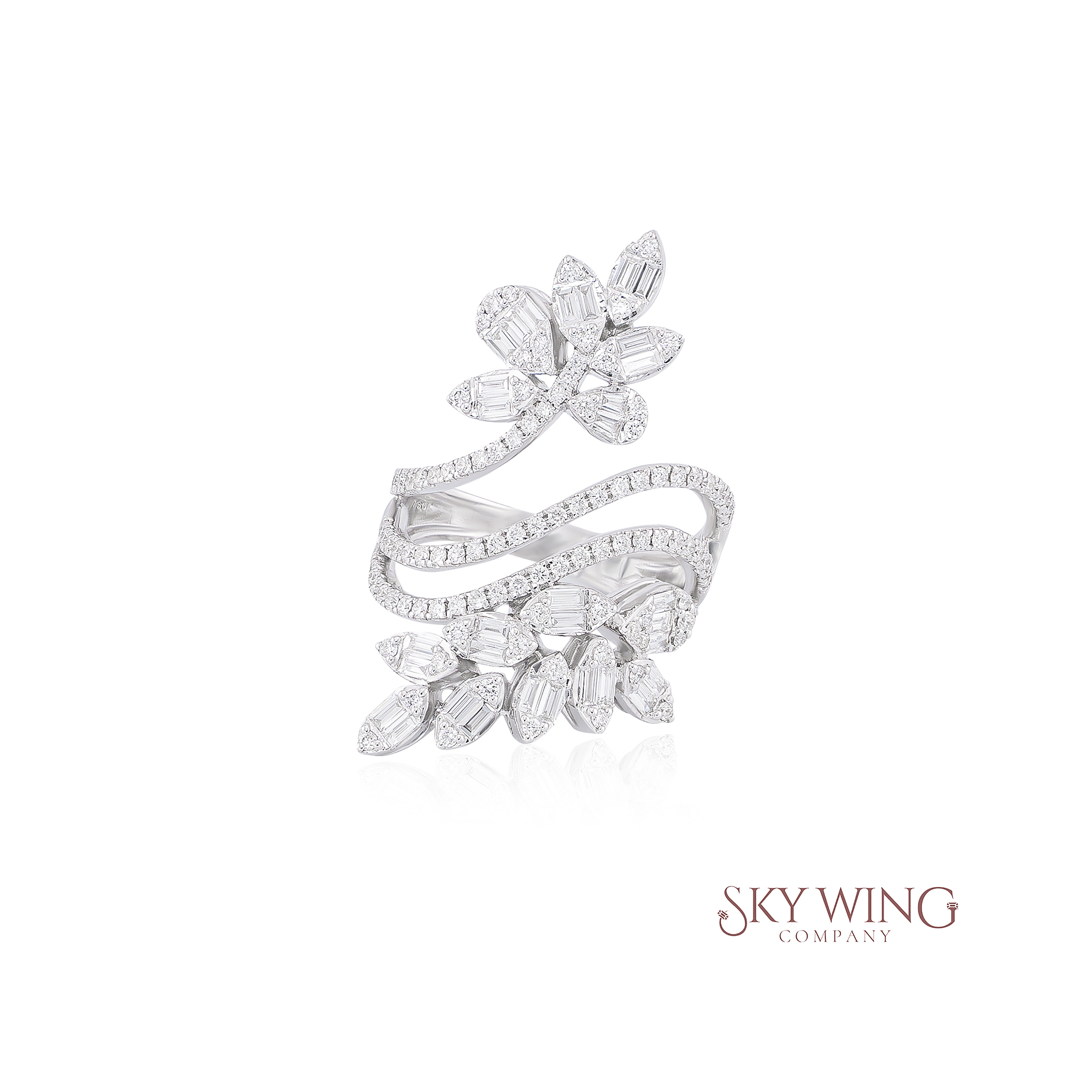 BAGUETTE AND ROUND DIAMOND FLORAL RING